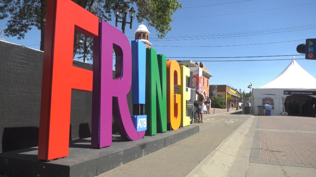 A large FRINGE word-art sculpture in a bike lane during the festival.