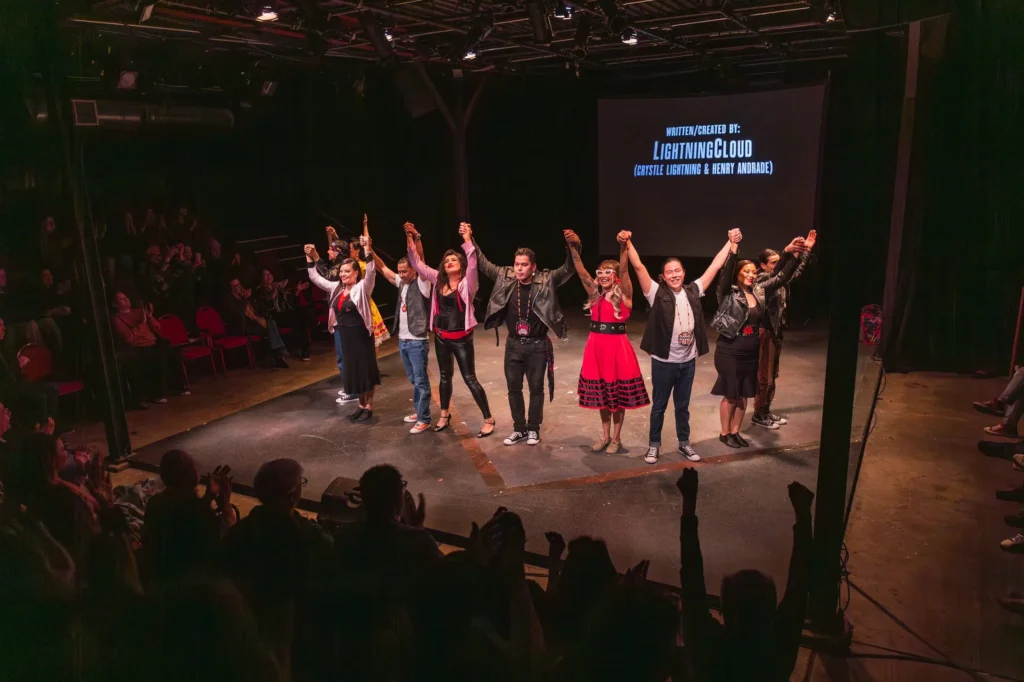 The cast of "Bear Grease" bow at the end of their show. 