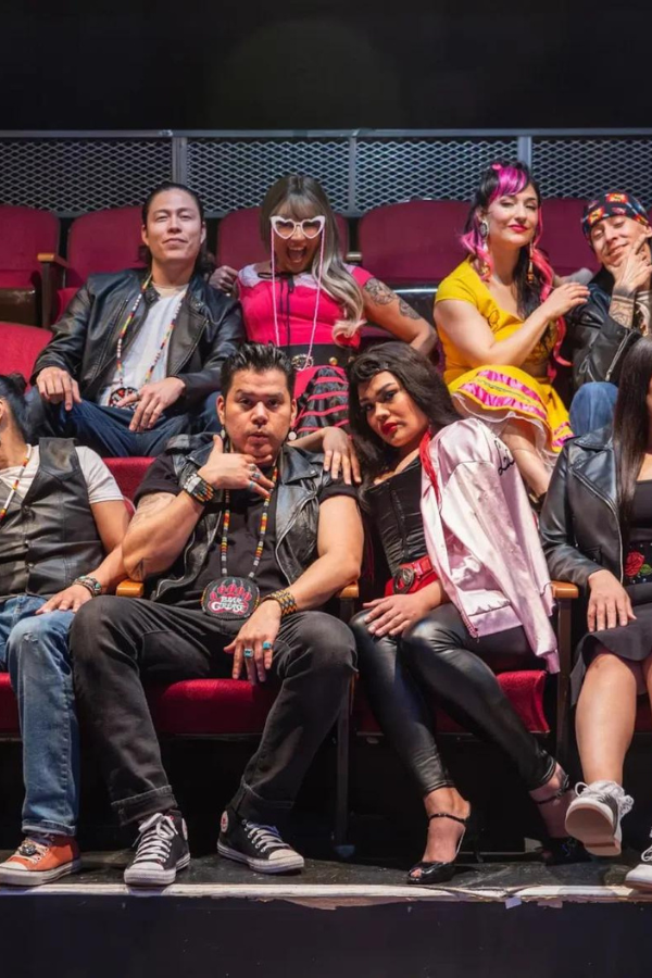 The cast of "Bear Grease" sit in audience chairs, and pose for the camera